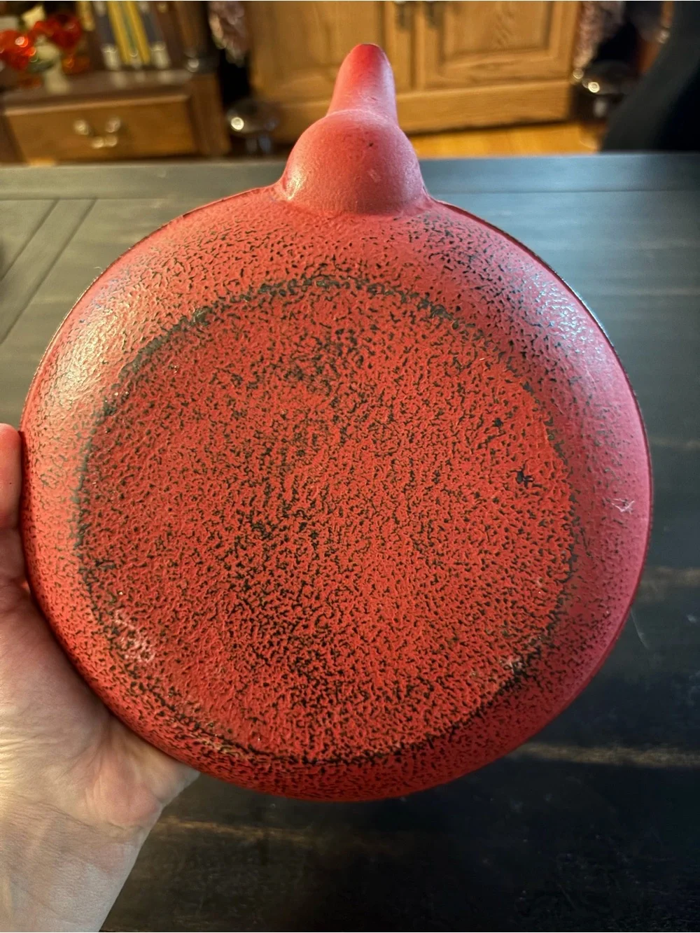 Red cast iron tea kettle